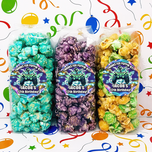 Bright colored popcorn party favor bags with Gamer theme personalized labels.